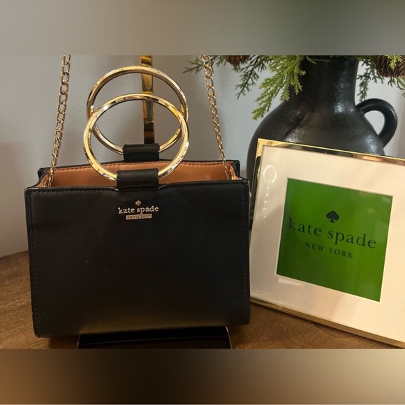 kate spade Handbags - EUC Kate Spade Black Bag with Gold Ring Handles